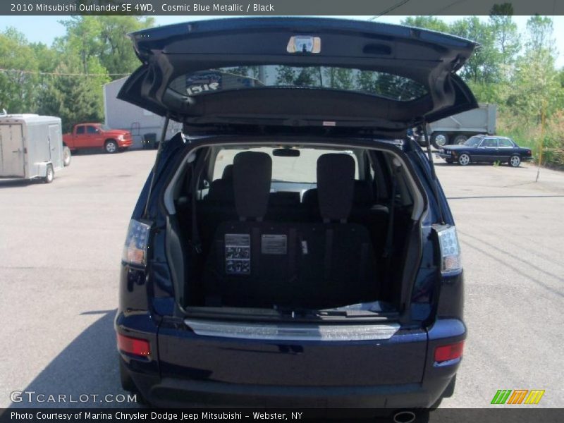 Cosmic Blue Metallic / Black 2010 Mitsubishi Outlander SE 4WD