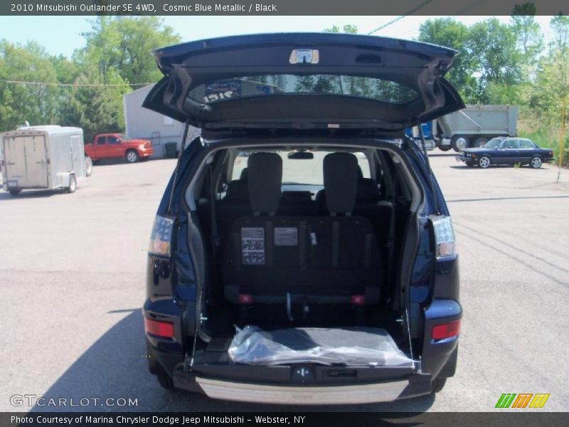 Cosmic Blue Metallic / Black 2010 Mitsubishi Outlander SE 4WD