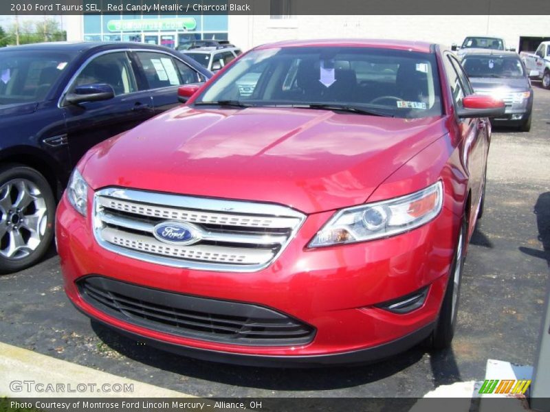 Red Candy Metallic / Charcoal Black 2010 Ford Taurus SEL