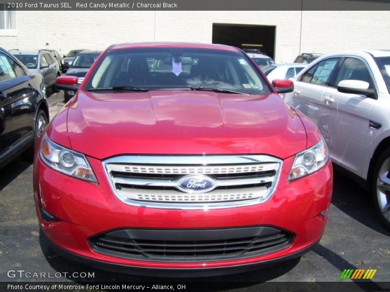 Red Candy Metallic / Charcoal Black 2010 Ford Taurus SEL