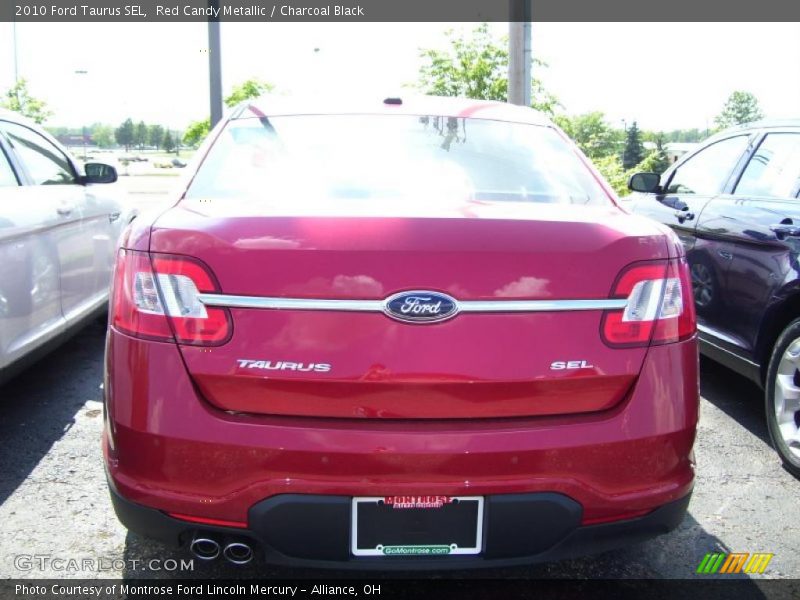 Red Candy Metallic / Charcoal Black 2010 Ford Taurus SEL