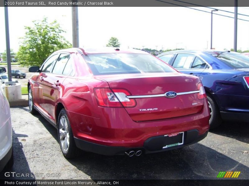 Red Candy Metallic / Charcoal Black 2010 Ford Taurus SEL