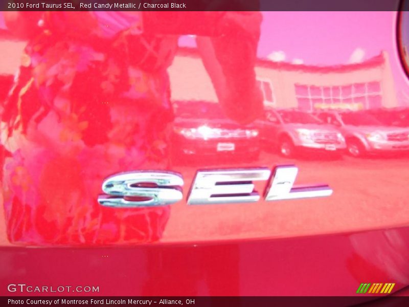 Red Candy Metallic / Charcoal Black 2010 Ford Taurus SEL