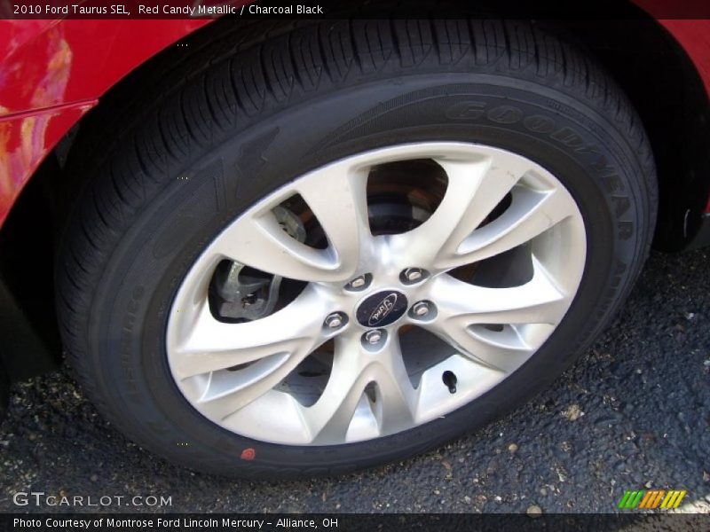 Red Candy Metallic / Charcoal Black 2010 Ford Taurus SEL