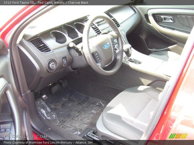 Red Candy Metallic / Charcoal Black 2010 Ford Taurus SEL