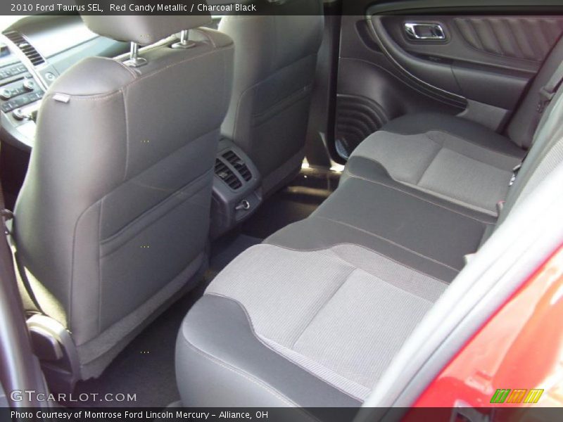 Red Candy Metallic / Charcoal Black 2010 Ford Taurus SEL