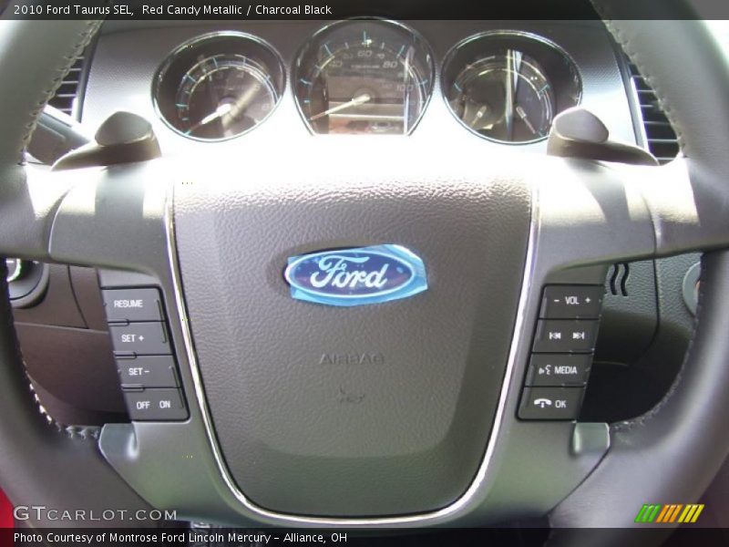 Red Candy Metallic / Charcoal Black 2010 Ford Taurus SEL