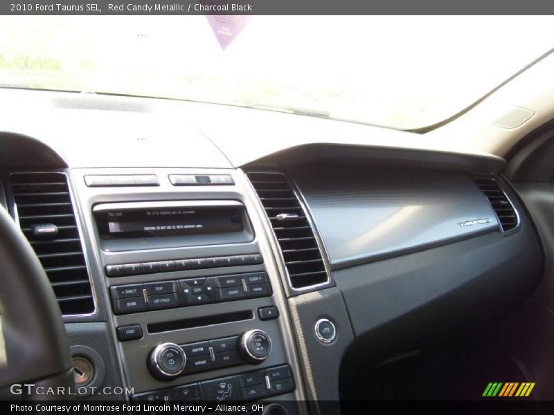 Red Candy Metallic / Charcoal Black 2010 Ford Taurus SEL