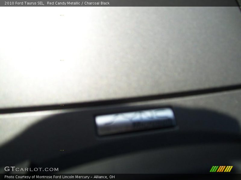 Red Candy Metallic / Charcoal Black 2010 Ford Taurus SEL