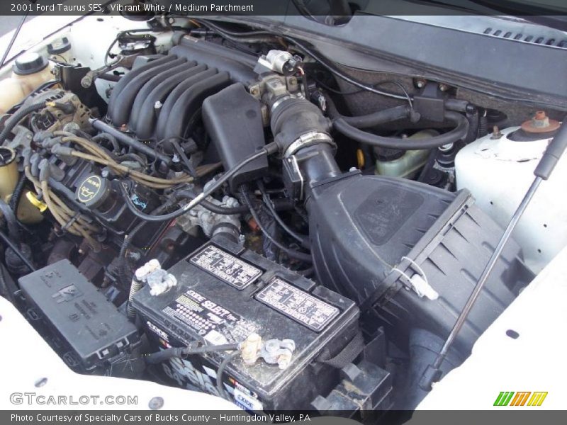 Vibrant White / Medium Parchment 2001 Ford Taurus SES