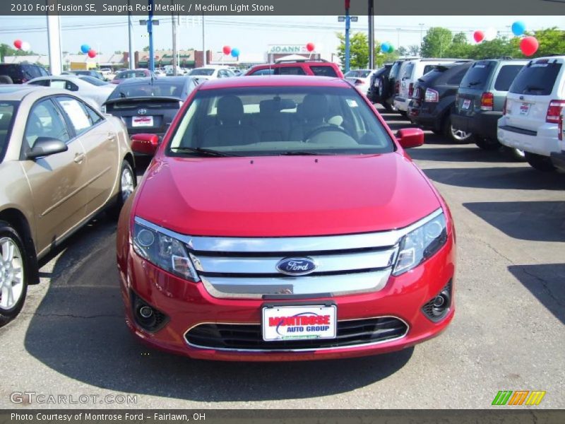 Sangria Red Metallic / Medium Light Stone 2010 Ford Fusion SE