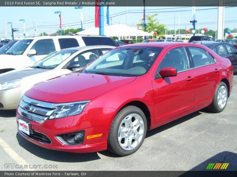 Sangria Red Metallic / Medium Light Stone 2010 Ford Fusion SE