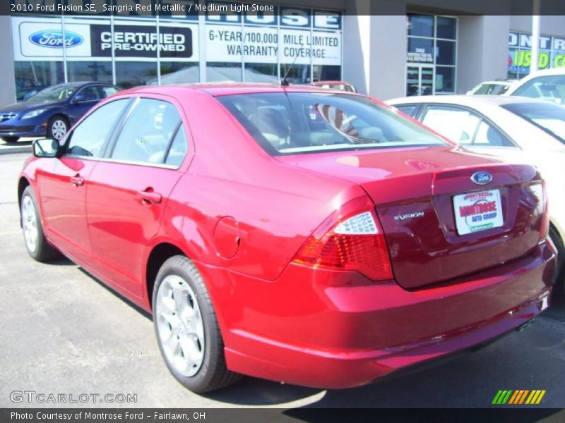 Sangria Red Metallic / Medium Light Stone 2010 Ford Fusion SE