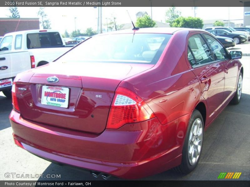 Sangria Red Metallic / Medium Light Stone 2010 Ford Fusion SE