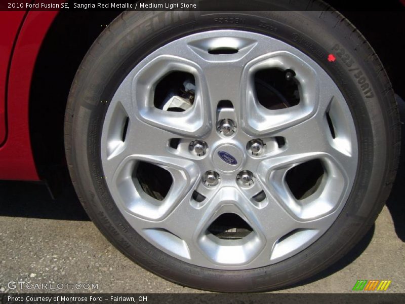 Sangria Red Metallic / Medium Light Stone 2010 Ford Fusion SE