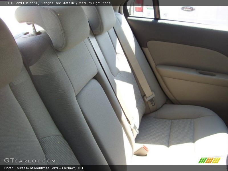 Sangria Red Metallic / Medium Light Stone 2010 Ford Fusion SE