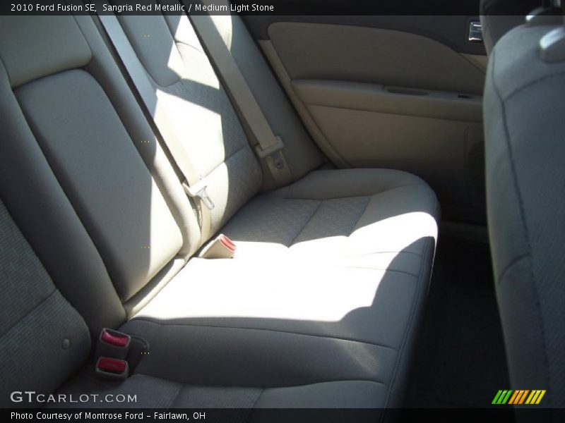 Sangria Red Metallic / Medium Light Stone 2010 Ford Fusion SE