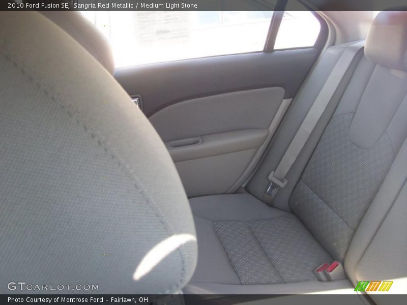 Sangria Red Metallic / Medium Light Stone 2010 Ford Fusion SE