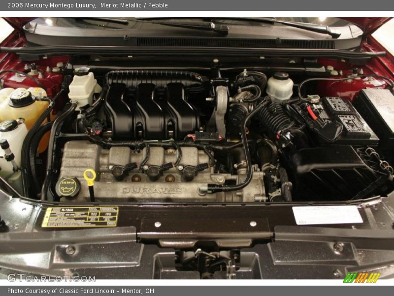 Merlot Metallic / Pebble 2006 Mercury Montego Luxury