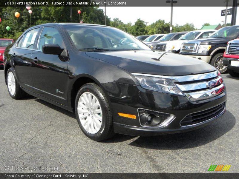 Tuxedo Black Metallic / Medium Light Stone 2010 Ford Fusion Hybrid