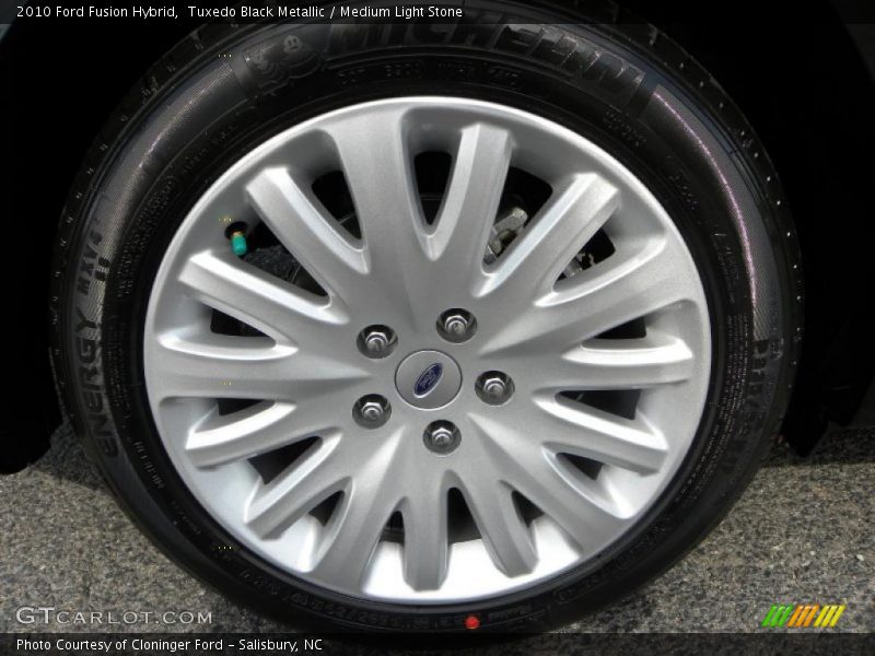 Tuxedo Black Metallic / Medium Light Stone 2010 Ford Fusion Hybrid