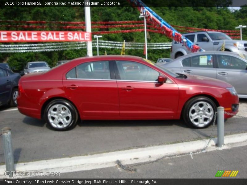 Sangria Red Metallic / Medium Light Stone 2010 Ford Fusion SE