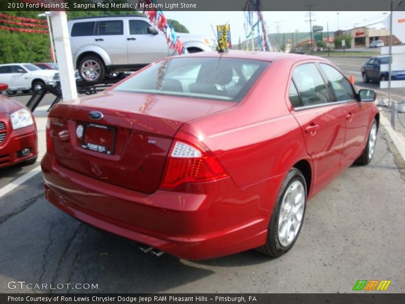 Sangria Red Metallic / Medium Light Stone 2010 Ford Fusion SE