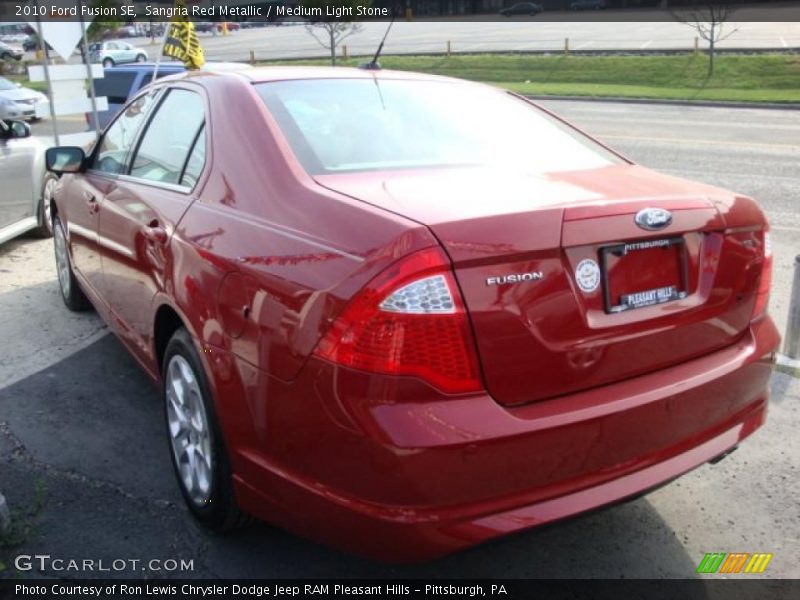 Sangria Red Metallic / Medium Light Stone 2010 Ford Fusion SE