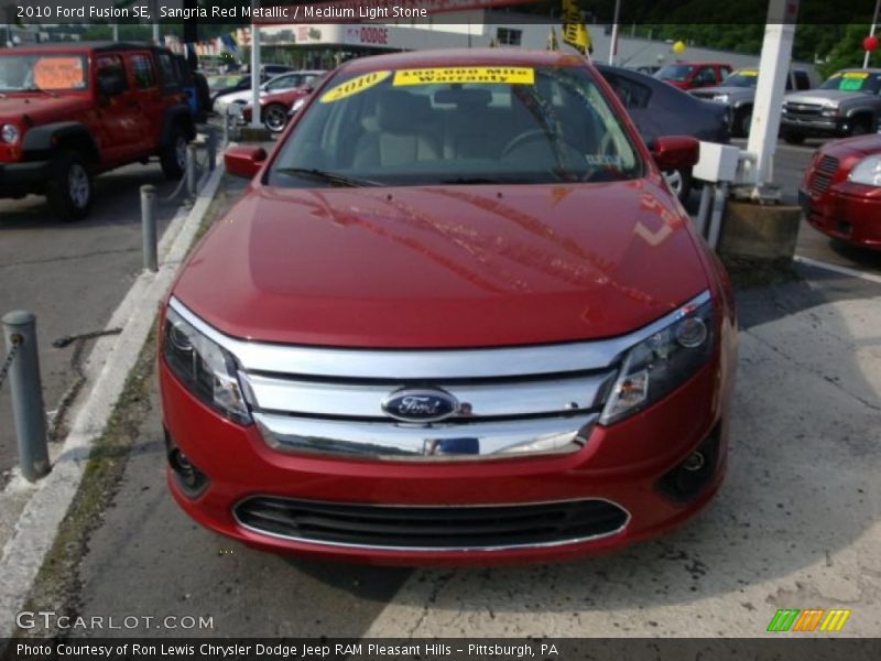 Sangria Red Metallic / Medium Light Stone 2010 Ford Fusion SE