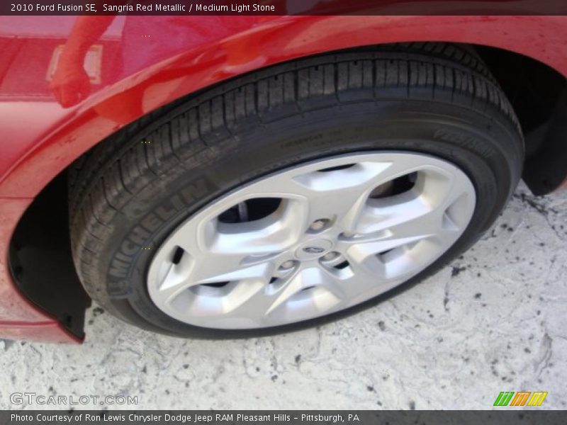 Sangria Red Metallic / Medium Light Stone 2010 Ford Fusion SE