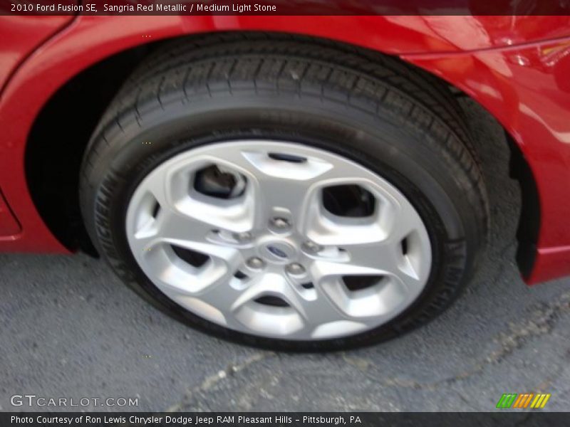 Sangria Red Metallic / Medium Light Stone 2010 Ford Fusion SE