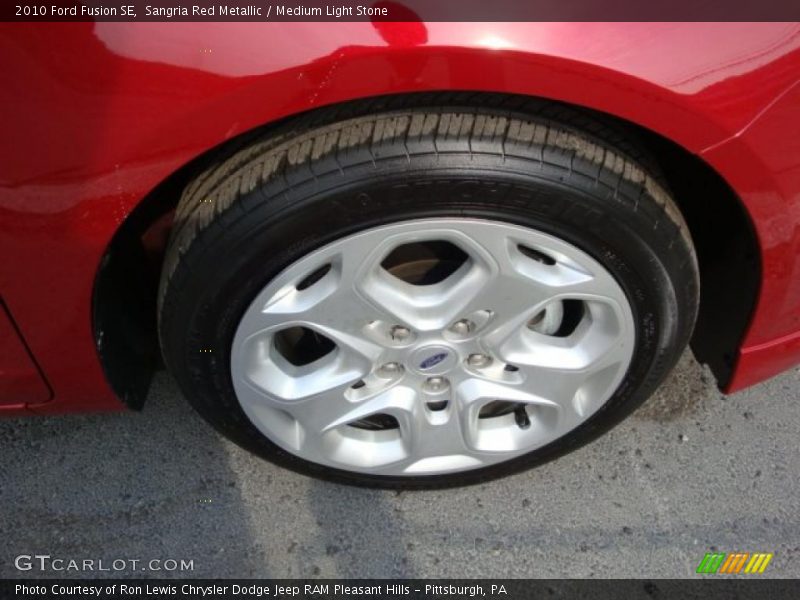 Sangria Red Metallic / Medium Light Stone 2010 Ford Fusion SE