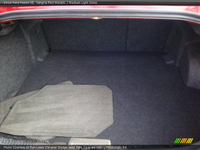 Sangria Red Metallic / Medium Light Stone 2010 Ford Fusion SE