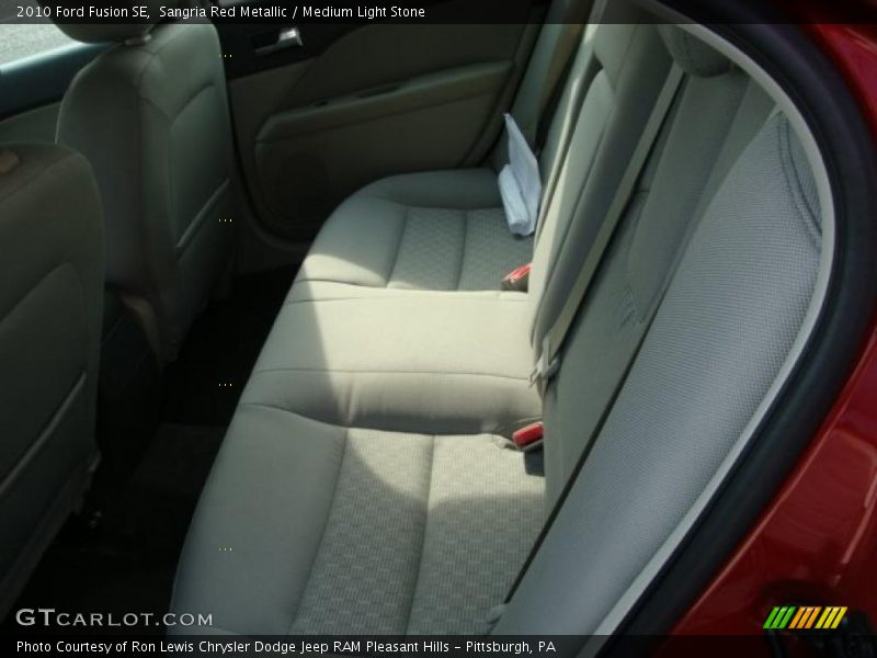 Sangria Red Metallic / Medium Light Stone 2010 Ford Fusion SE