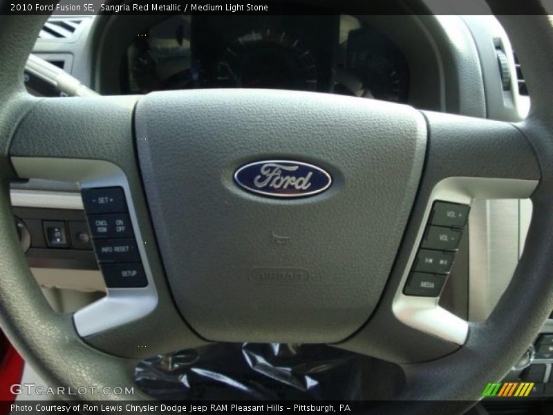Sangria Red Metallic / Medium Light Stone 2010 Ford Fusion SE
