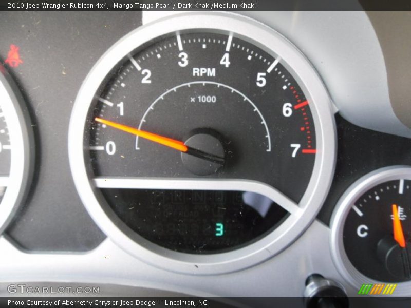Mango Tango Pearl / Dark Khaki/Medium Khaki 2010 Jeep Wrangler Rubicon 4x4