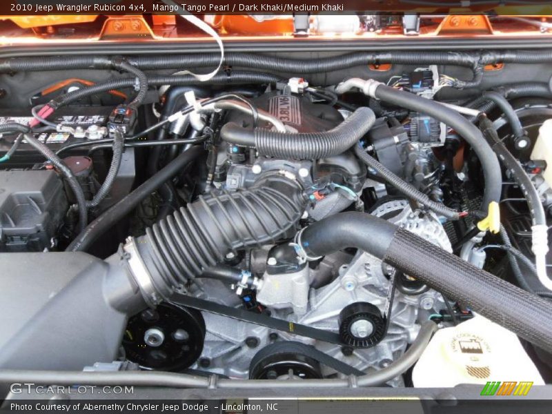 Mango Tango Pearl / Dark Khaki/Medium Khaki 2010 Jeep Wrangler Rubicon 4x4