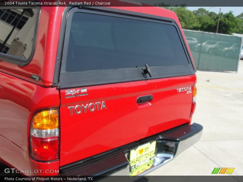 Radiant Red / Charcoal 2004 Toyota Tacoma Xtracab 4x4