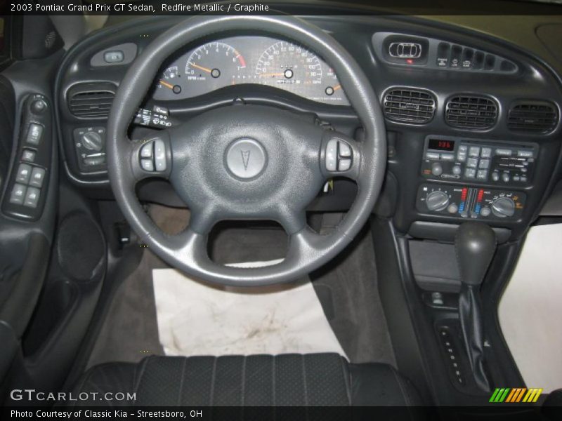 Redfire Metallic / Graphite 2003 Pontiac Grand Prix GT Sedan
