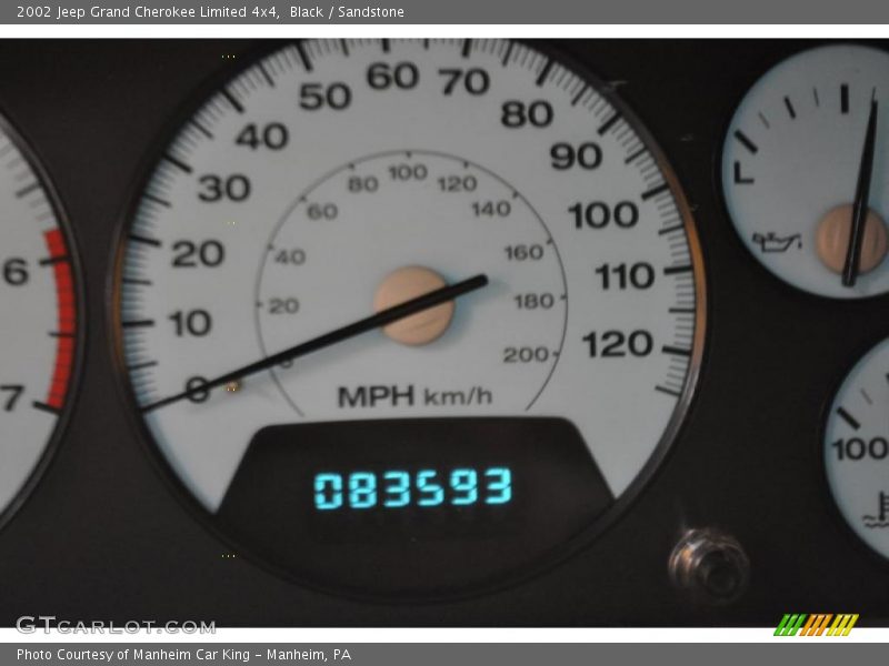 Black / Sandstone 2002 Jeep Grand Cherokee Limited 4x4