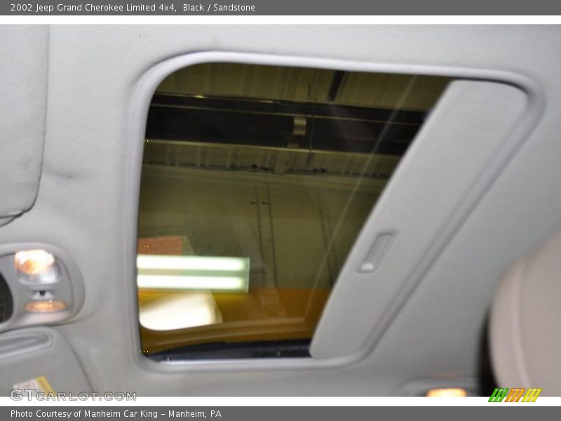 Black / Sandstone 2002 Jeep Grand Cherokee Limited 4x4