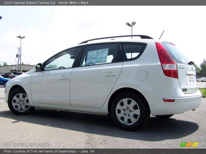 Nordic White / Black 2010 Hyundai Elantra Touring GLS