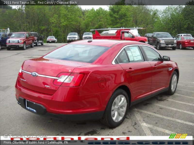 Red Candy / Charcoal Black 2011 Ford Taurus SEL