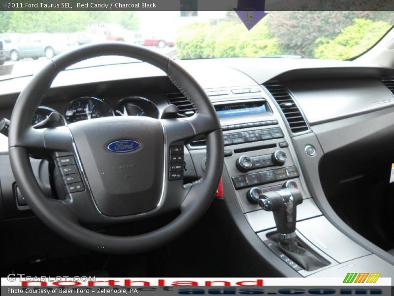 Red Candy / Charcoal Black 2011 Ford Taurus SEL