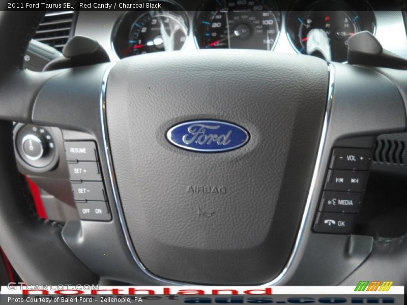 Red Candy / Charcoal Black 2011 Ford Taurus SEL