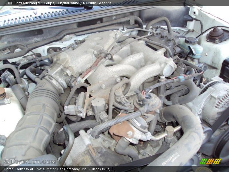 Crystal White / Medium Graphite 2000 Ford Mustang V6 Coupe