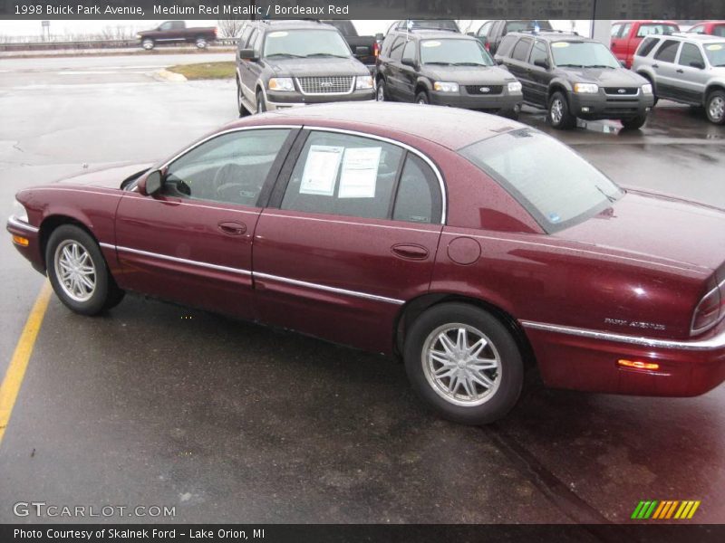 Medium Red Metallic / Bordeaux Red 1998 Buick Park Avenue