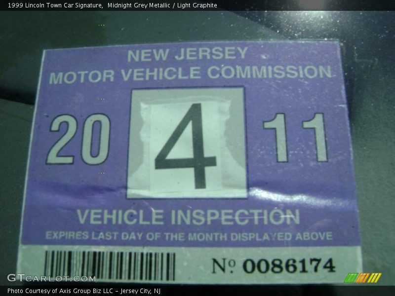 Midnight Grey Metallic / Light Graphite 1999 Lincoln Town Car Signature