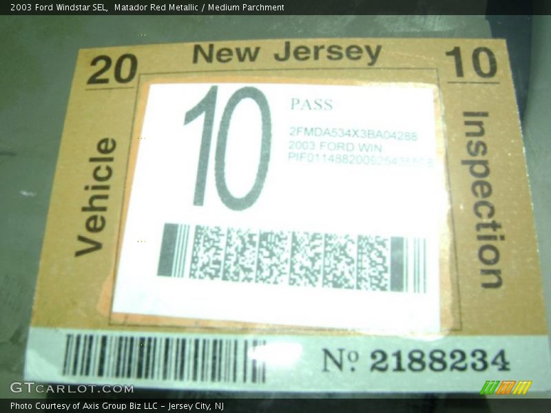 Matador Red Metallic / Medium Parchment 2003 Ford Windstar SEL