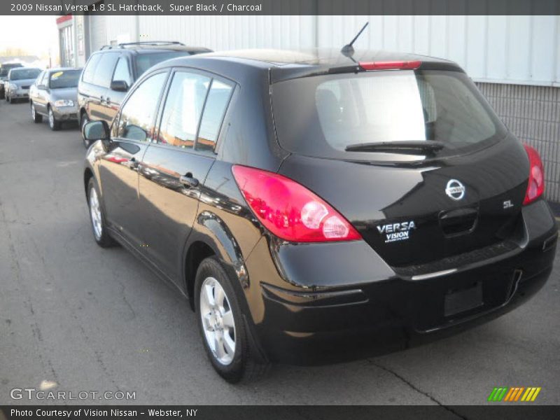 Super Black / Charcoal 2009 Nissan Versa 1.8 SL Hatchback
